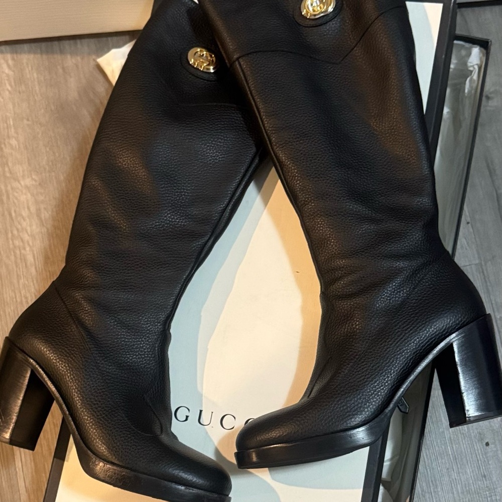 Gucci Black Leather Heeled Boots with Gold Details size 41. Worn once. EUC